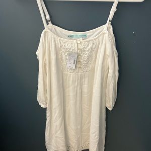 White off the shoulder knee length dress.